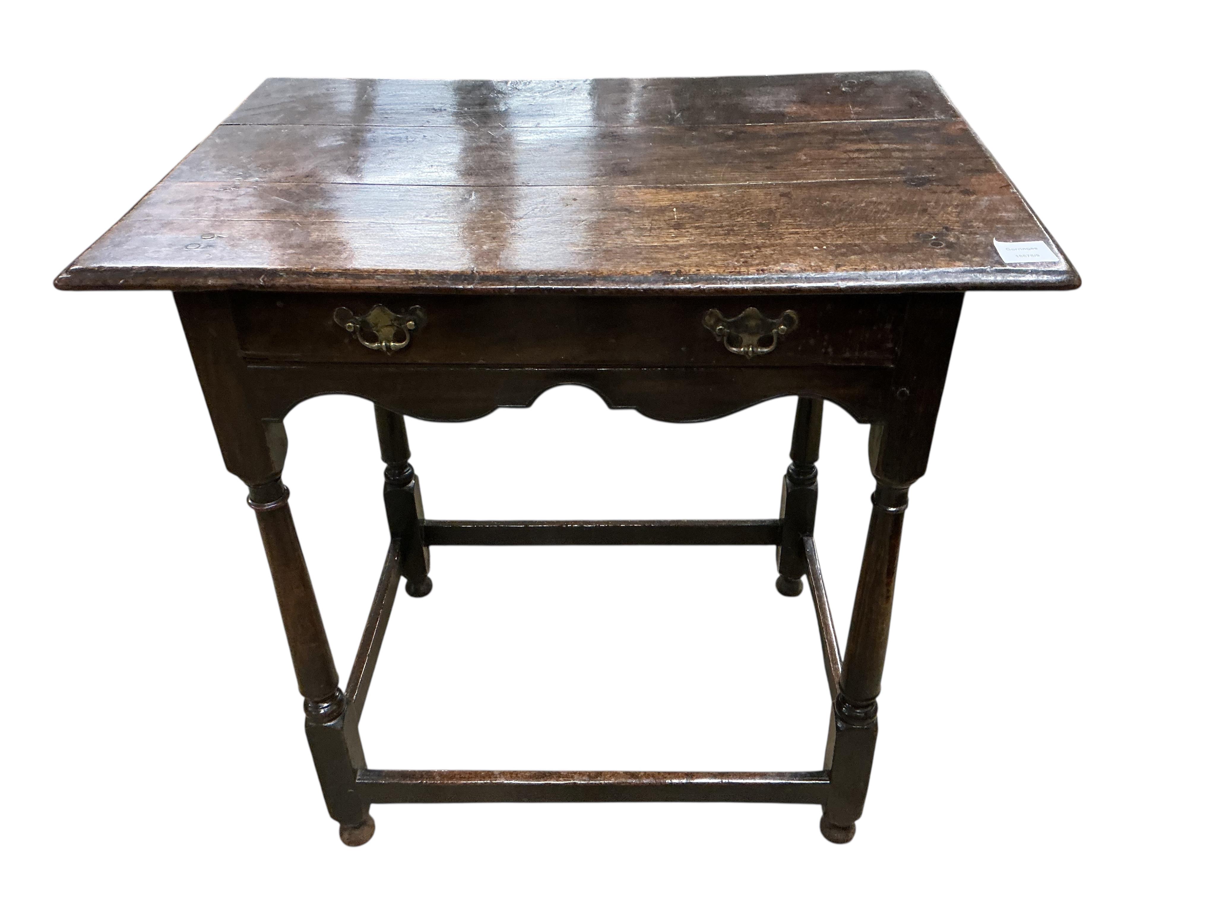 An early 18th century oak side table, fitted with a single long drawer, width 74cm, depth 49cm, height 74cm